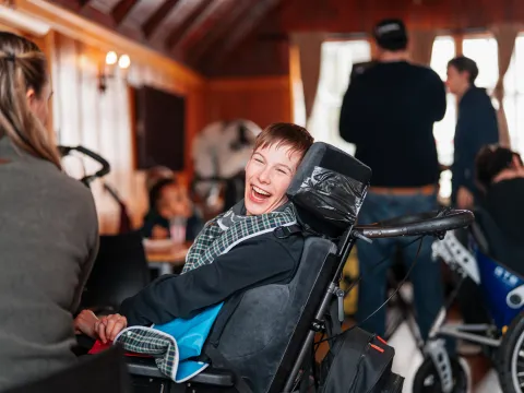 Boy smiling in wheelchair