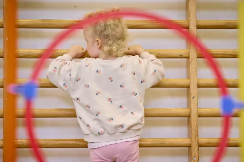 girl climbing ladders