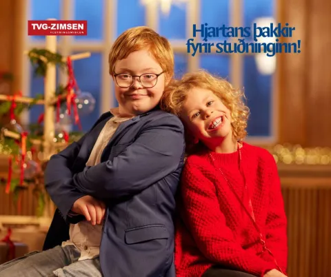 kids by the christmas tree