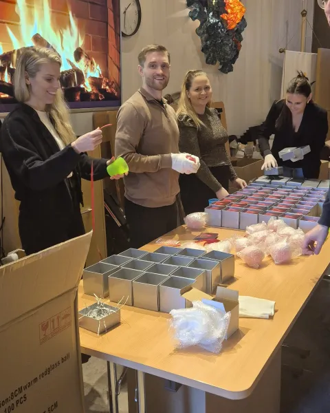 people packing Globe of Goodwill