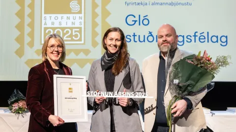 Three people on stage